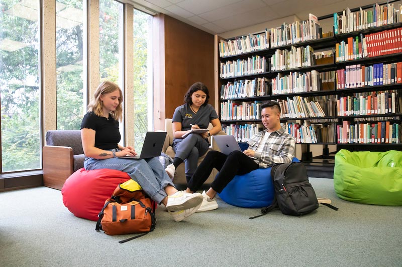 PLU students in library