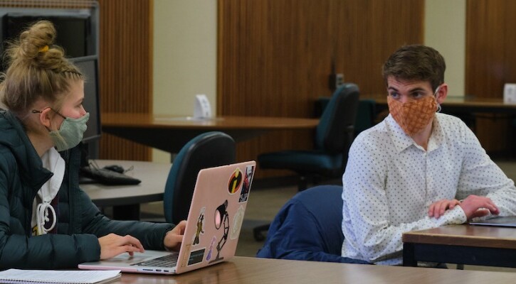 Students studying in the library during the COVID-19 pandemic early in spring semester, Wednesday, Feb. 24, 2021, at PLU. (Photo/John Froschauer)