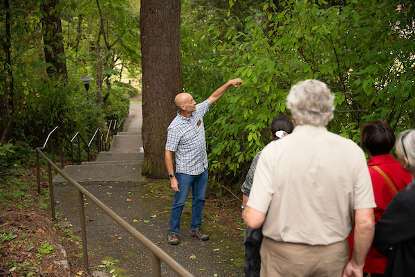 Dr. Michael Behrens leads a Native Plant Walk during the Lutheran Studies Conference, Thursday, Sept. 26, 2024, at PLU. (PLU Photo / Sy Bean)