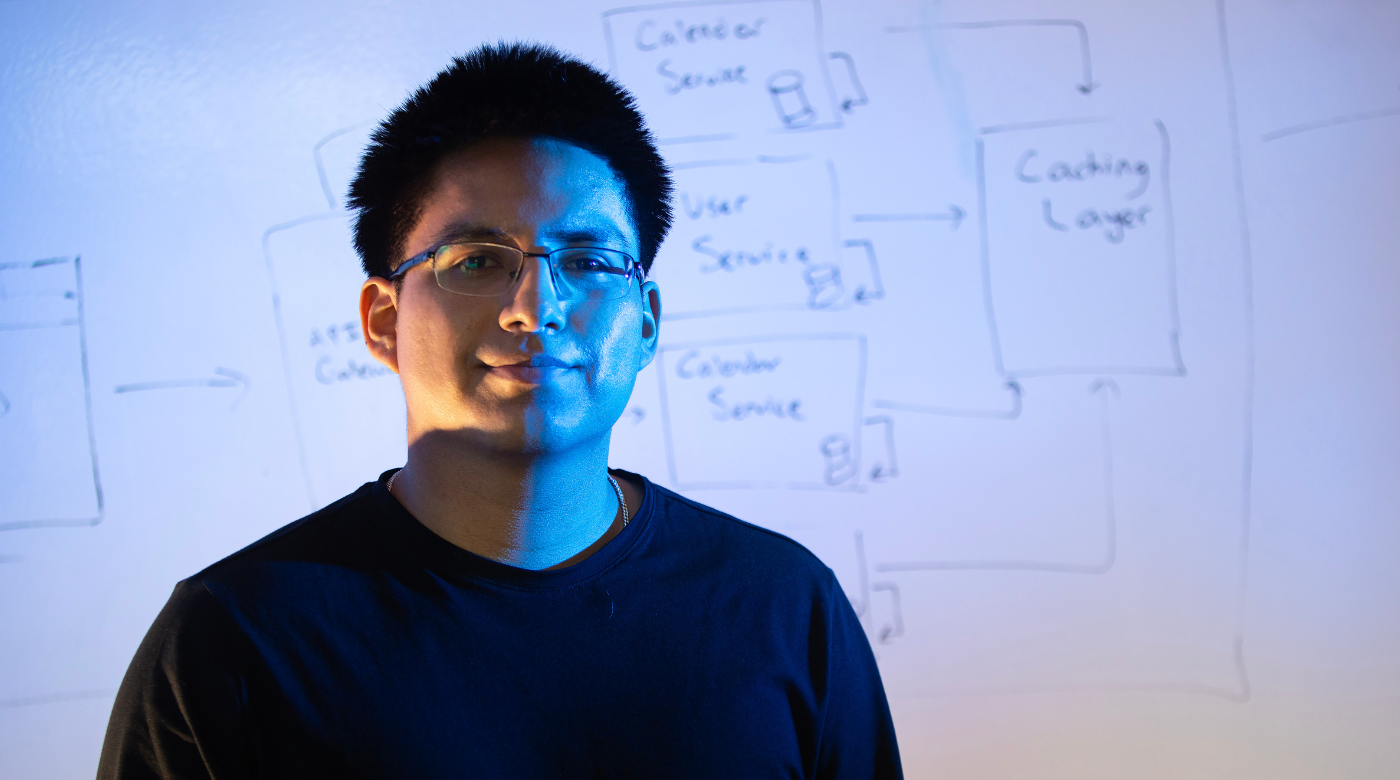 PLU Computer Science major Stuart Gavidia poses for a portrait for his Senior Spotlight, Wednesday, May 1, 2024, at PLU. Gavidia interned at Amazon and Pierce-County, and is already working part-time as a software engineer. (PLU Photo / Sy Bean)