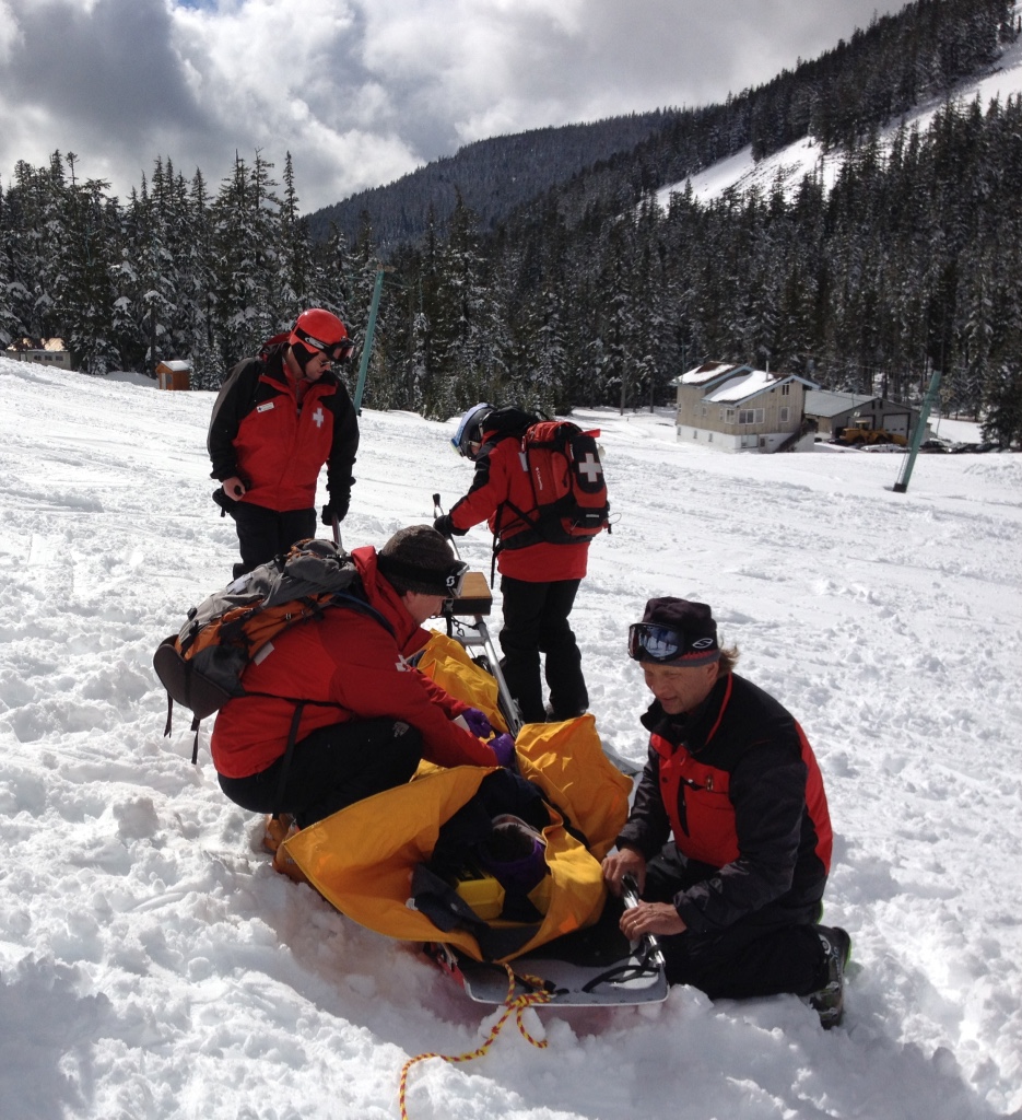 ski patrol volunteers in the snow