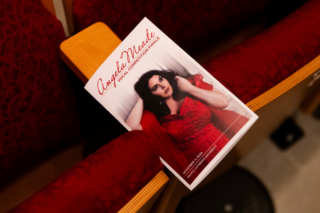 A photo of the program with Angela Meade on a chair.