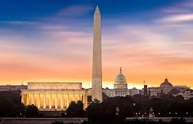 sunset on the Washington monument and capitol building in D.C.